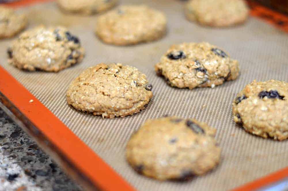 Baked Big & Chewy Vegan Oatmeal Raisin Cookies on a silpat