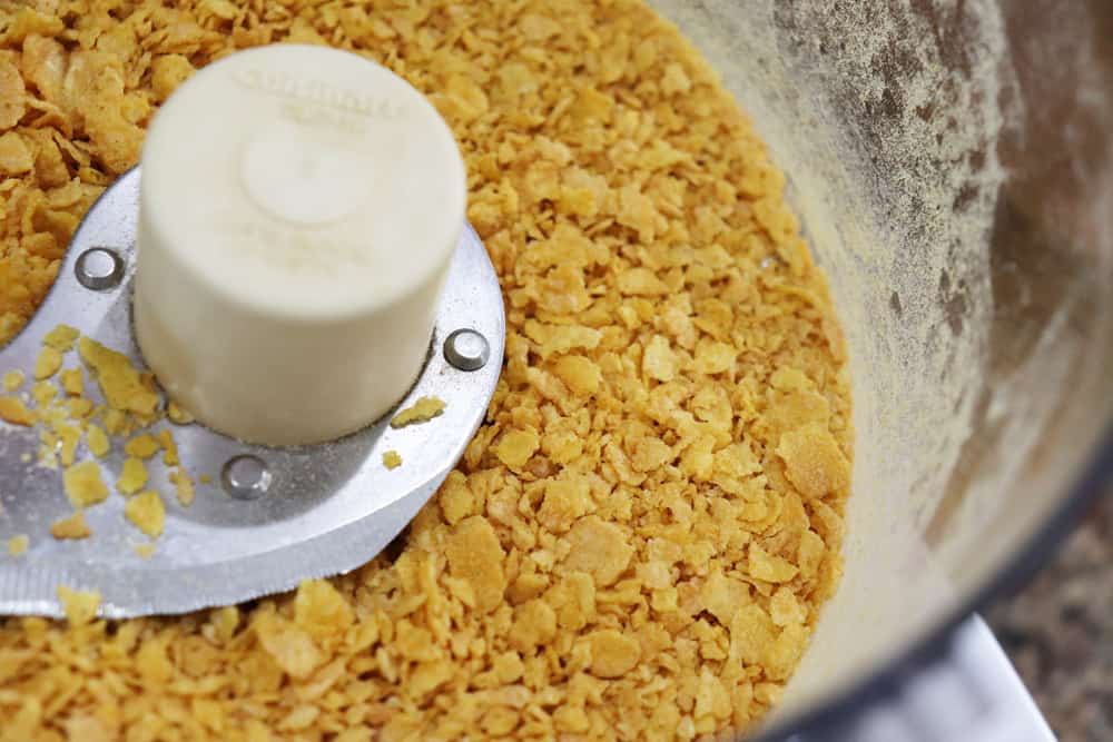 Processed corn flake crumbs