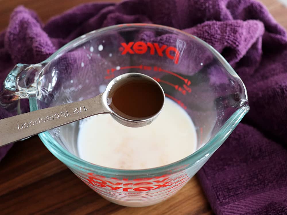 Adding vinegar to almond milk 