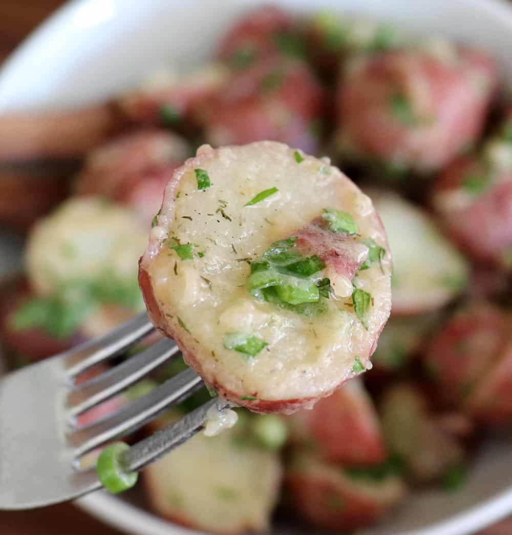 Close up bite of Warm Potato Salad with Dijon Vinaigrette